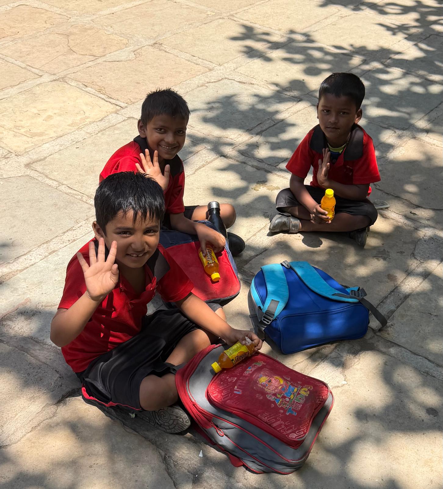 2023 Student Scholarship Program — children receiving school supplies and support